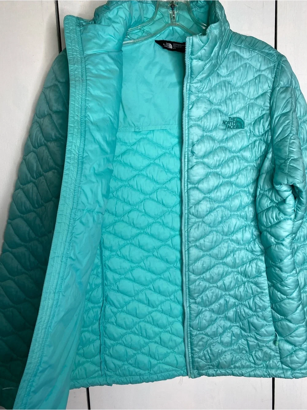 The North Face zip up puffer jacket size large
